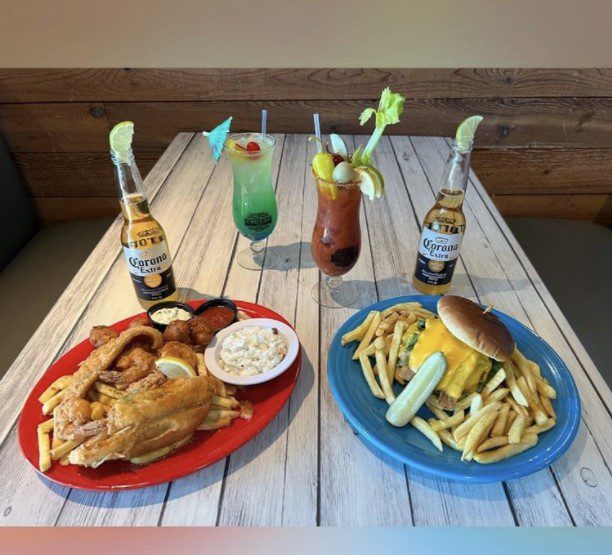 Plates of food and drinks at a restaurant in Myrtle Beach.