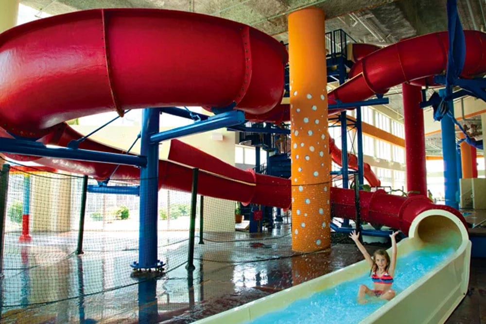 Winding waterslide at Dunes Village Resort's indoor waterpark in Myrtle Beach.