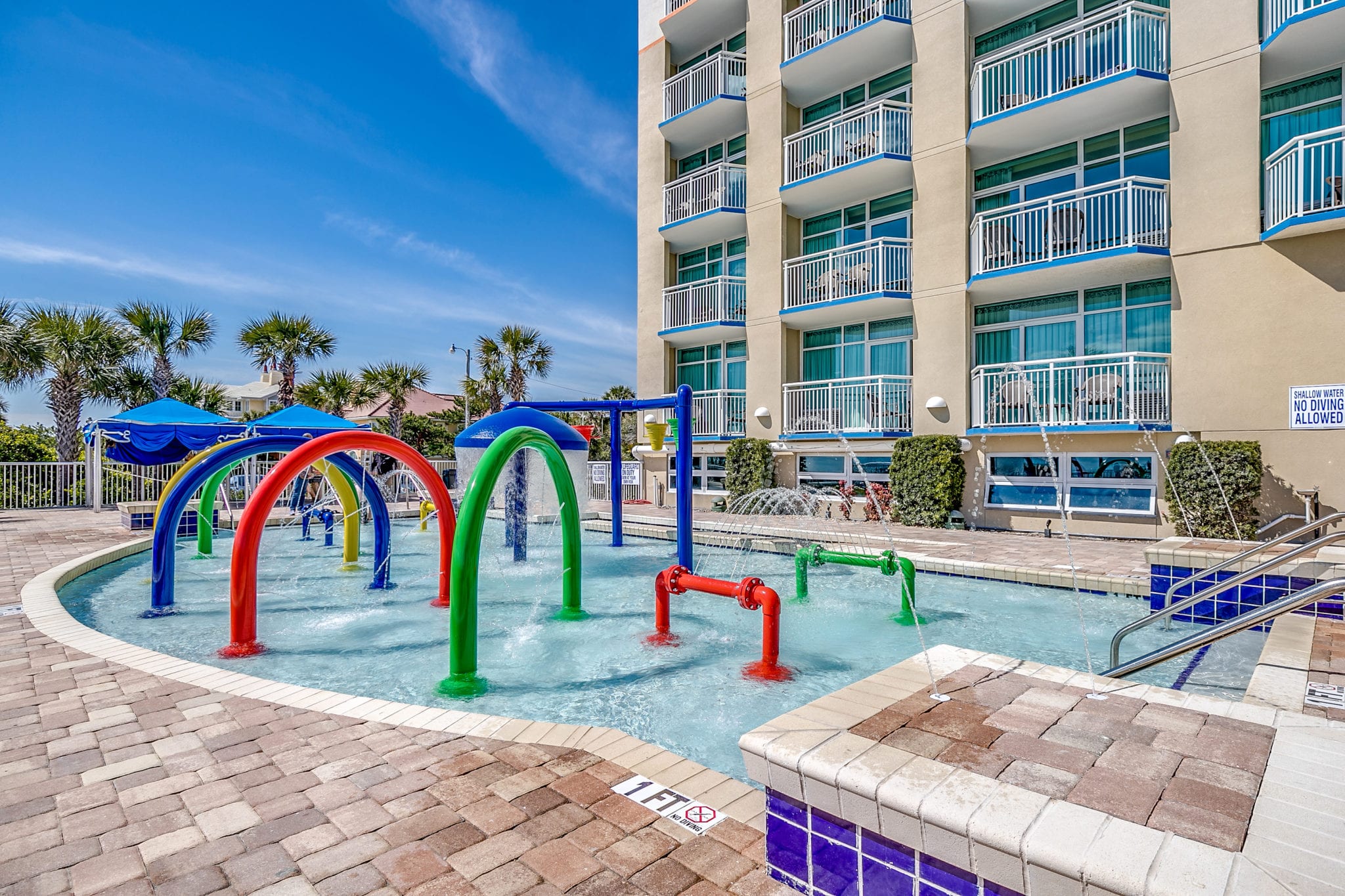 Outdoor water play area for kids at Dunes Village Resort in Myrtle Beach.