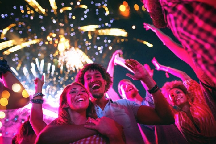 Friends watching the fireworks at Broadway at the Beach