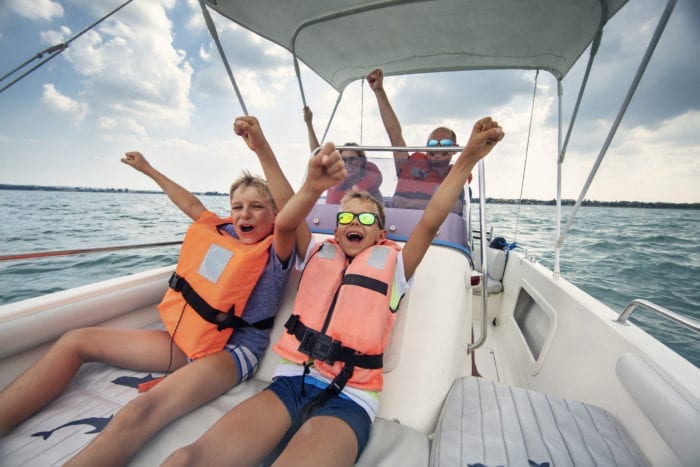 Family relaxing on a Myrtle Beach boat tour