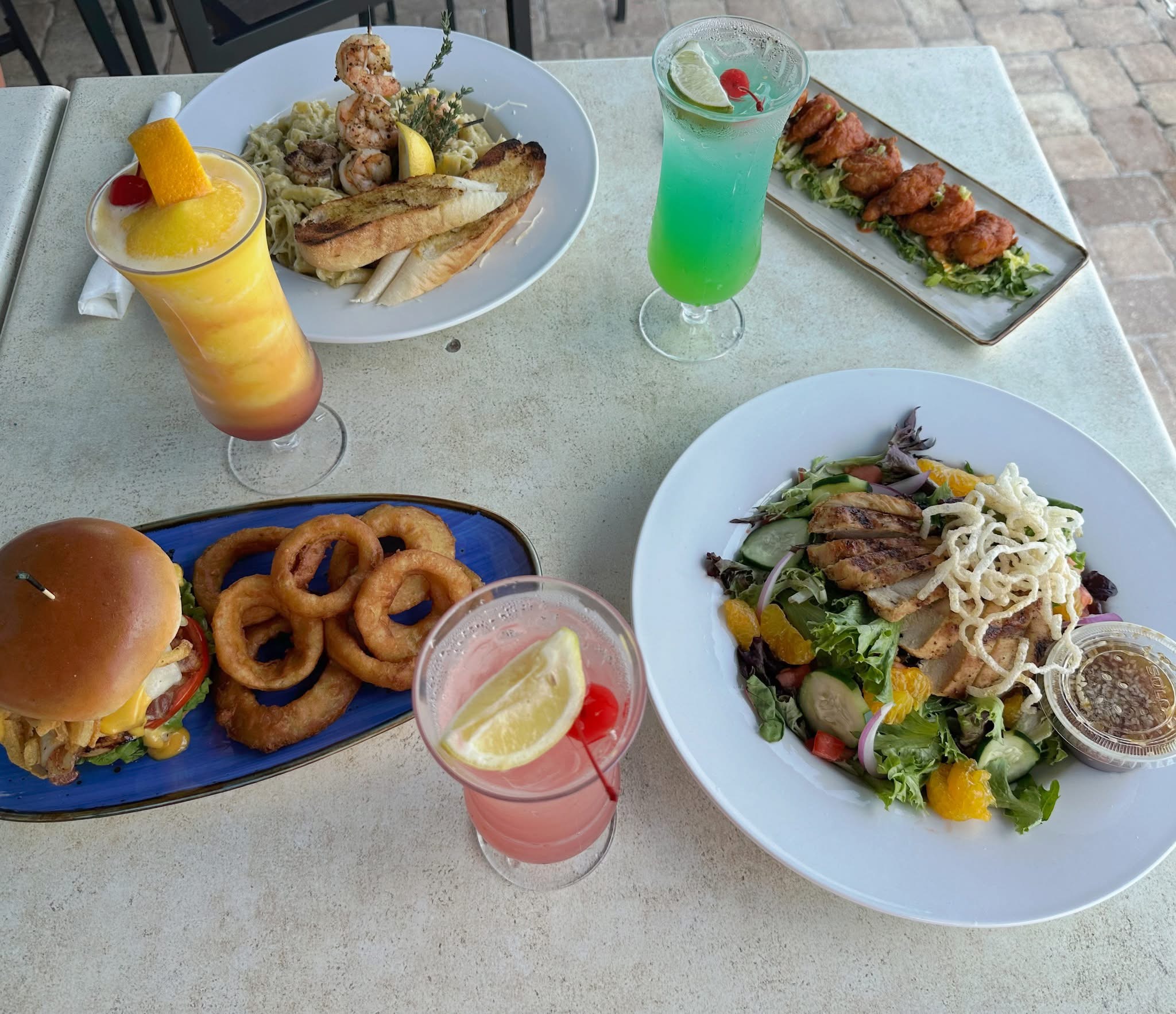A table with various food and drinks