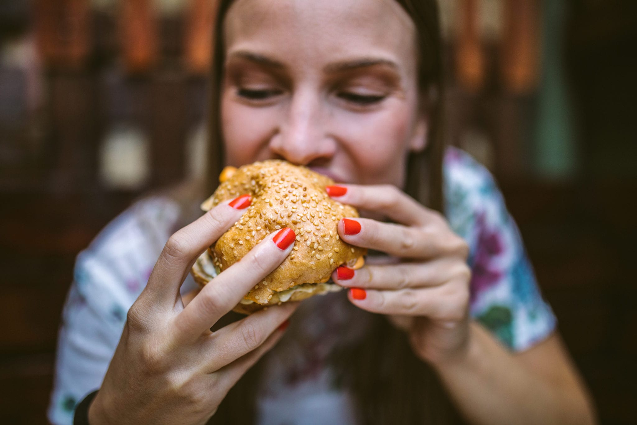 Enjoying a burger from Must Eat Myrtle Beach List.